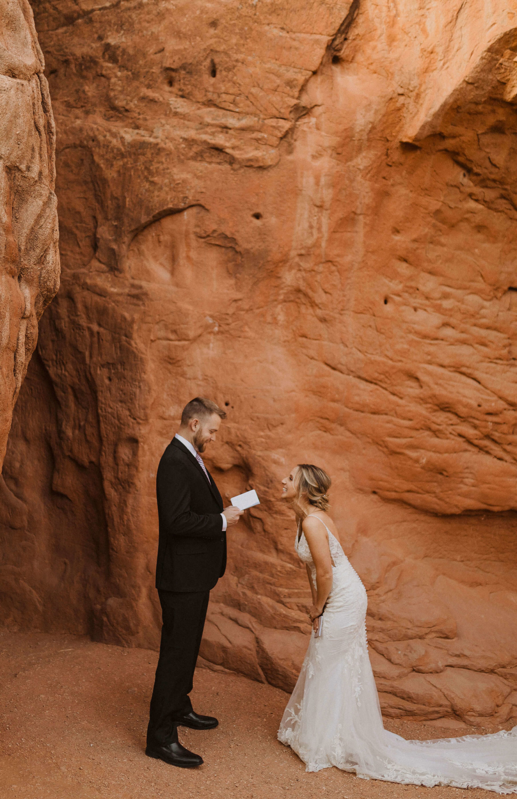 couple reading elopement vows at Garden of the Gods