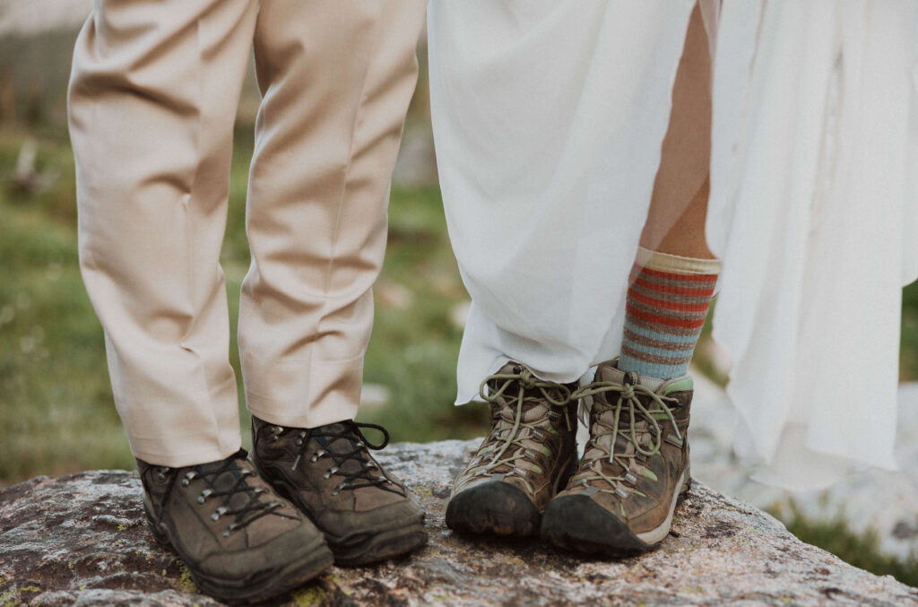 elopement couple wearing hiking shoes