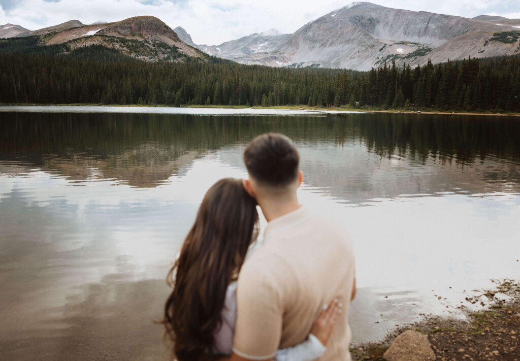 Bride and groom looking at Brainard Lake