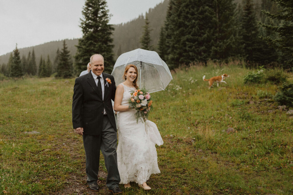couple looking at each other and smiling for Ouray elopement photos