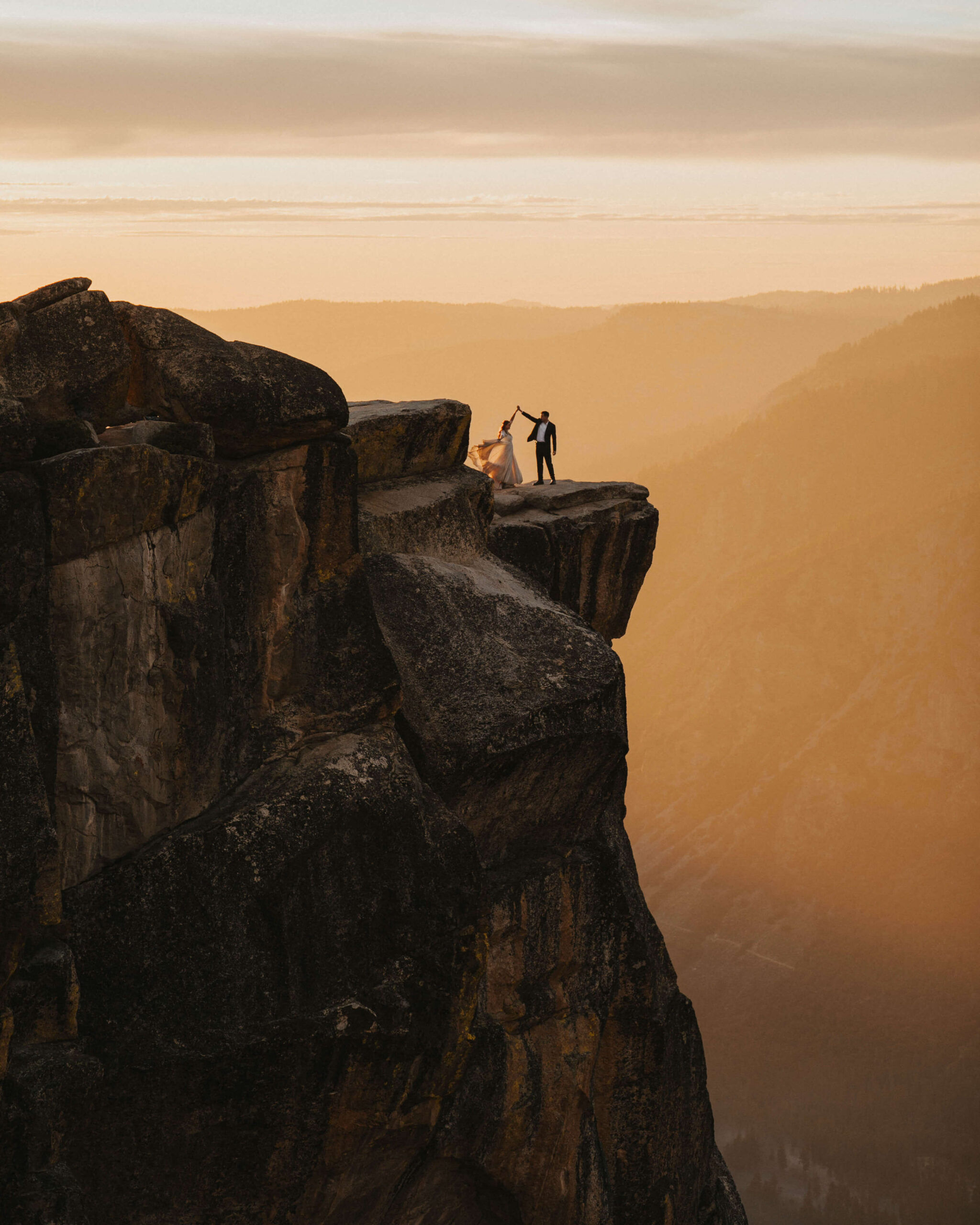 couple posing at sunset for affordable elopement