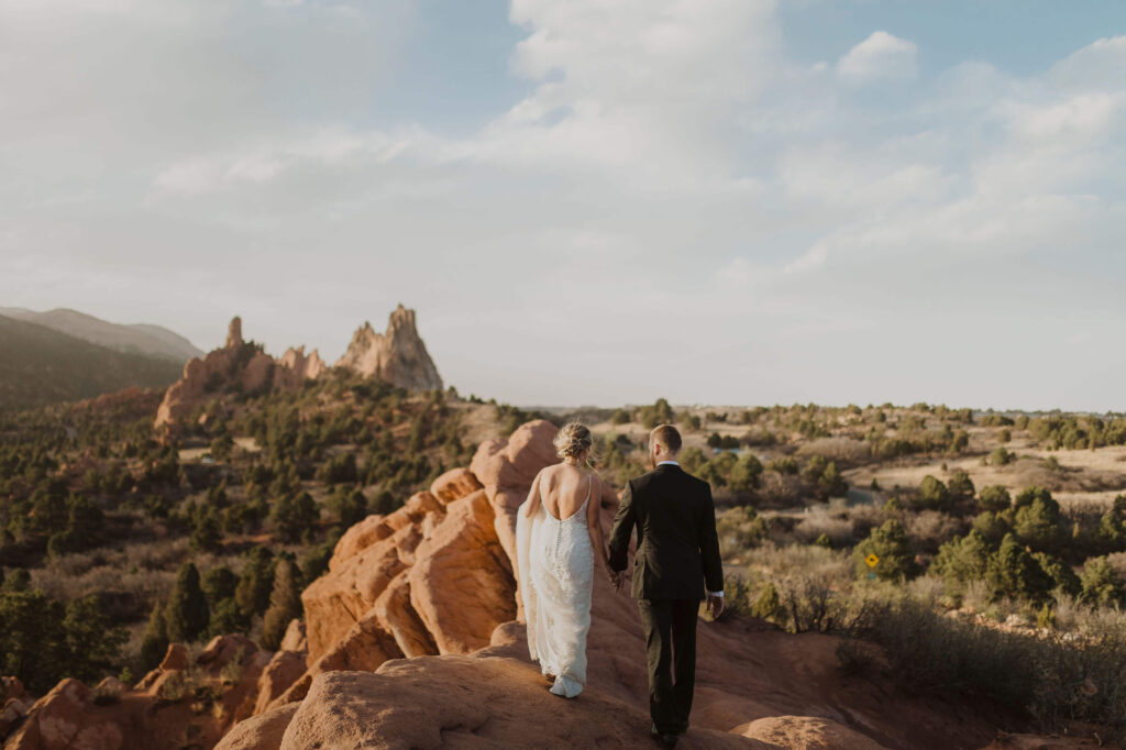 elopement couple with backs facing camera at Garden of the Gods