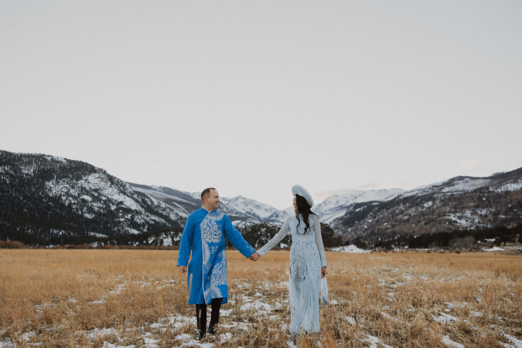 bride and groom posing in Rocky Mountain National Park