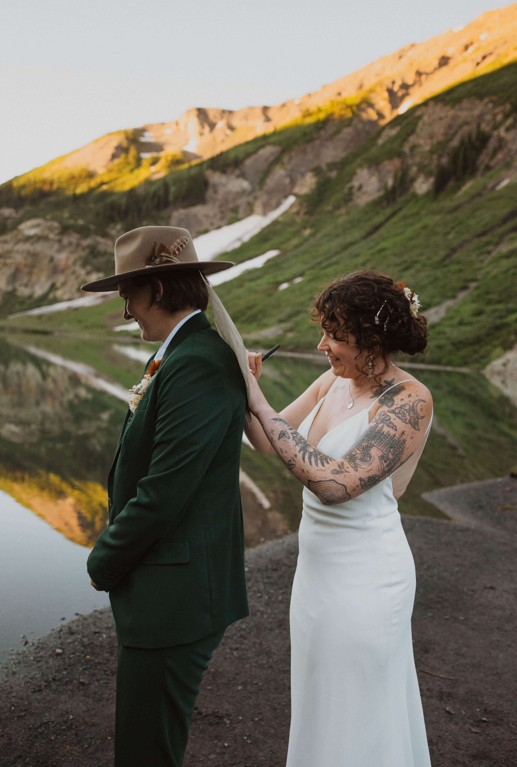 bride signing marriage license to self-solemnize wedding in Colorado