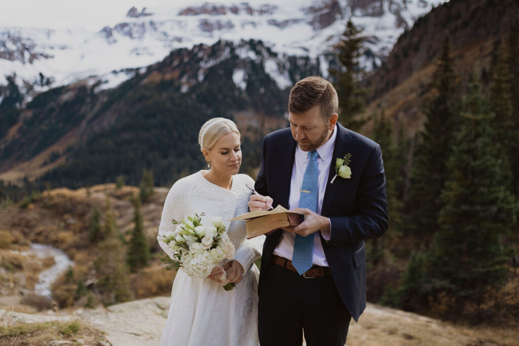 groom signing marriage license to self-solemnize Colorado marriage