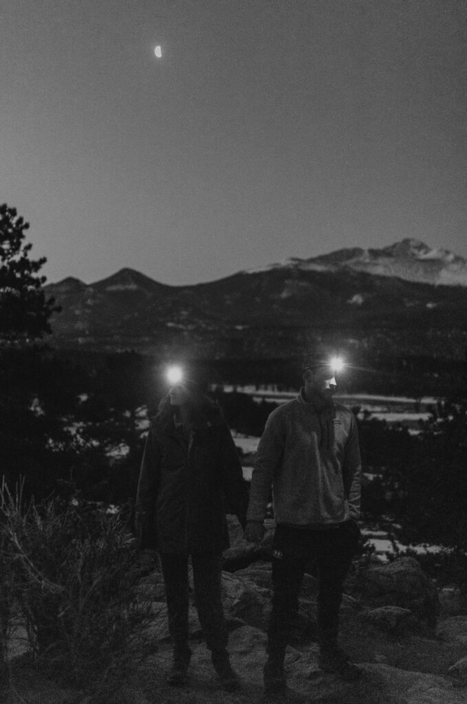 bride and groom in the dark with head lamps