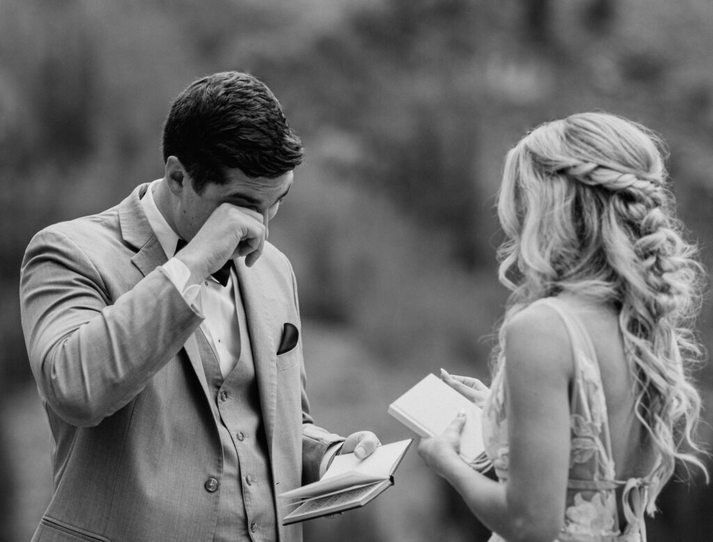 Bride and groom reading vows at Maroon Bells wedding