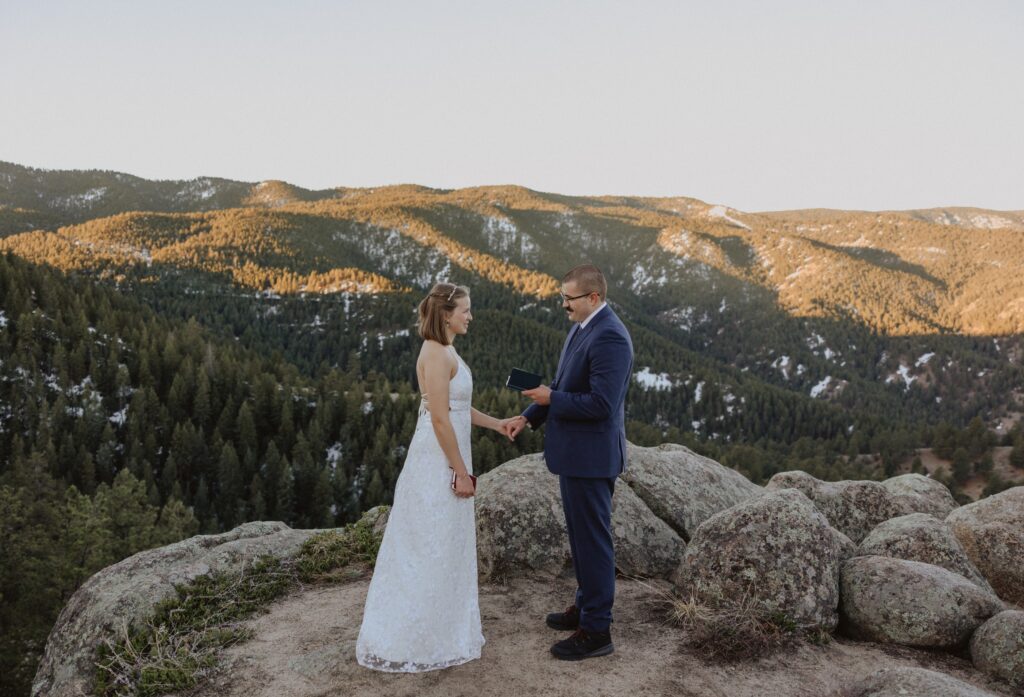 couple posing for elopement pictures in Boulder