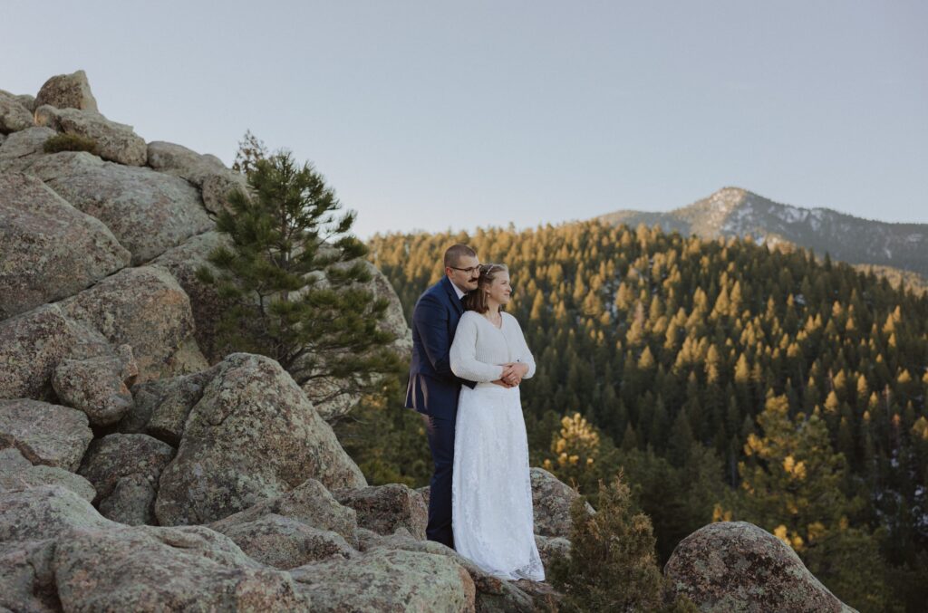 couple posing for elopement pictures in Boulder