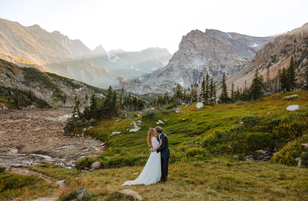 couple posing for elopement pictures in Boulder