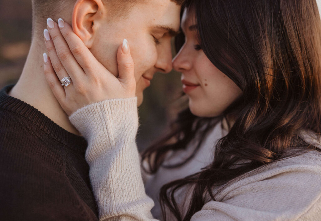 couple positing for Garden of the Gods engagement photos