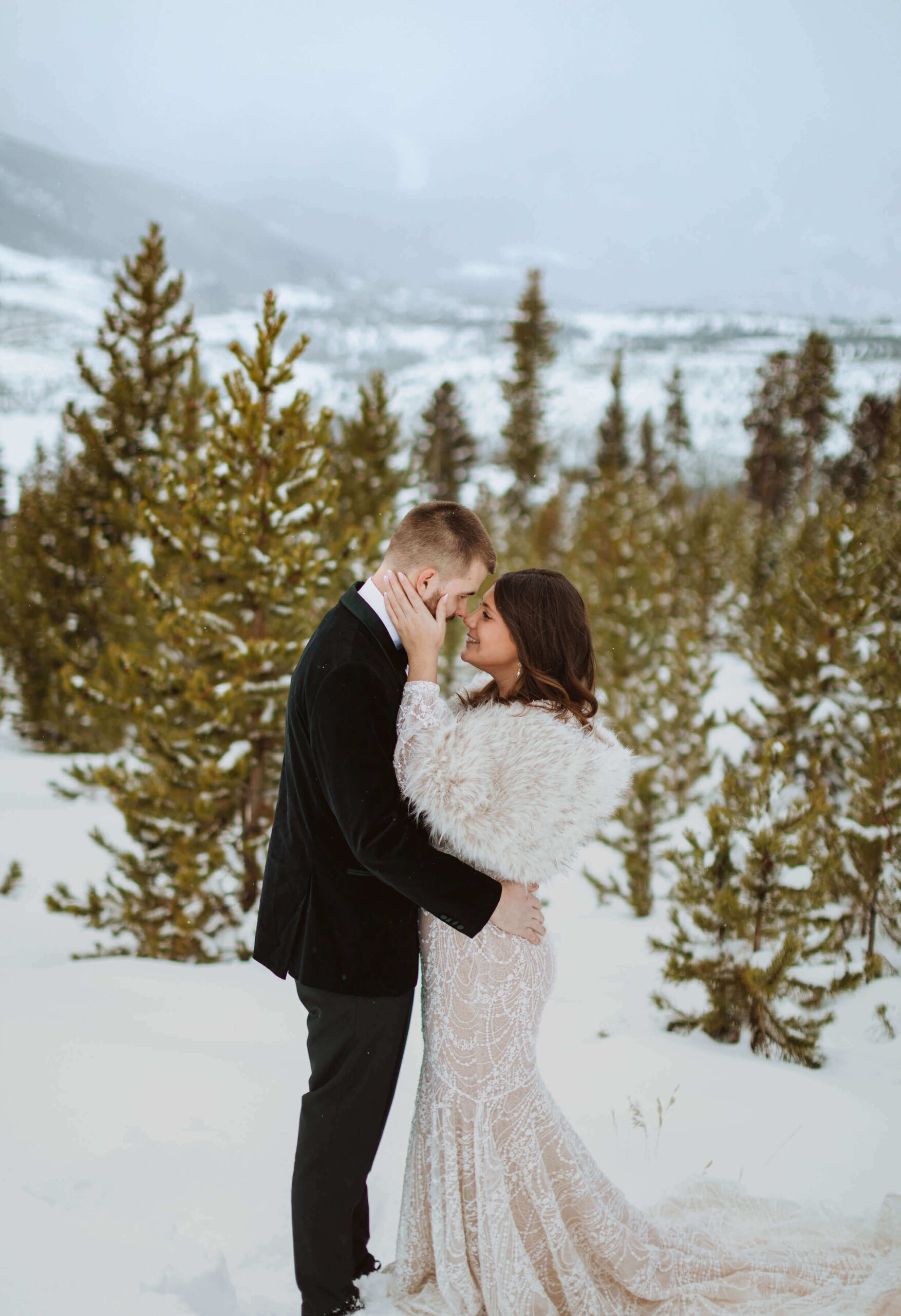 bride and groom embracing for Sapphire Point Overlook wedding photos