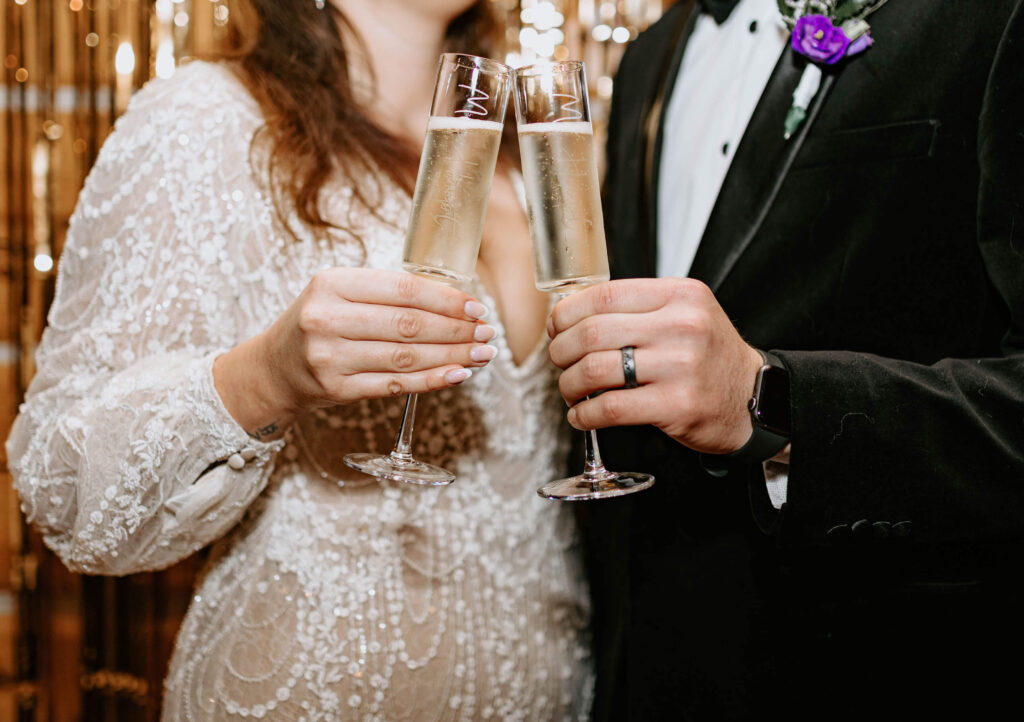 bride and groom with champage