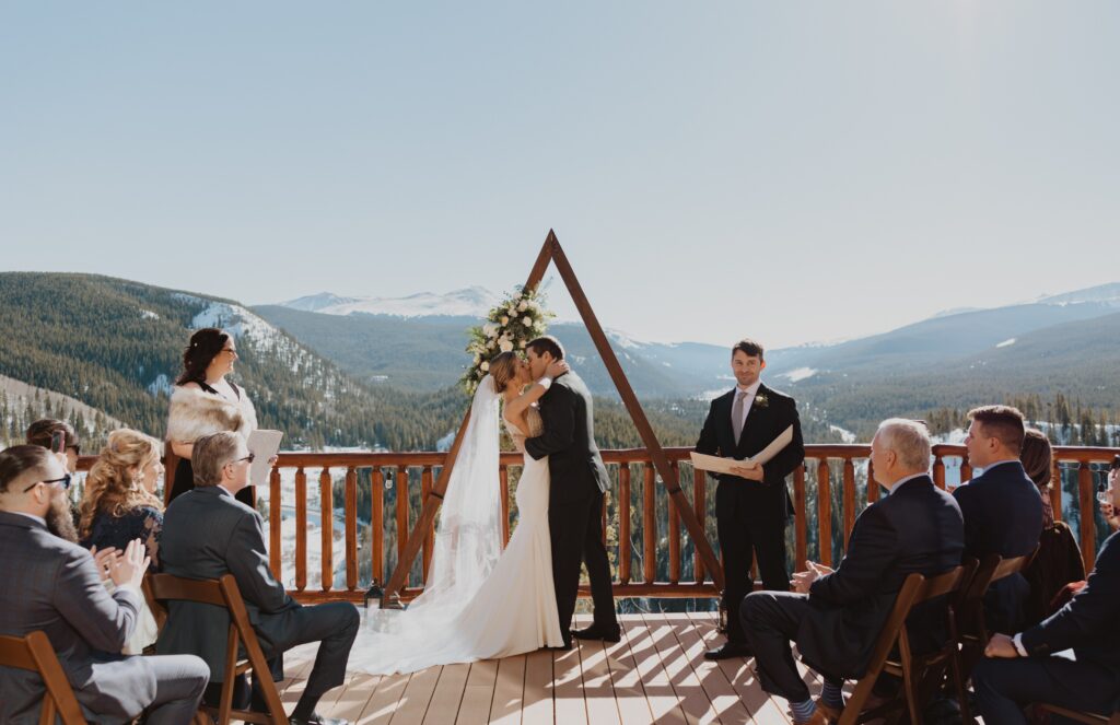 Couple having elopement ceremony at The Lodge at Breckenridge