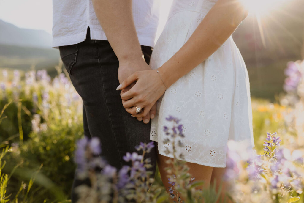 Couple holding hands