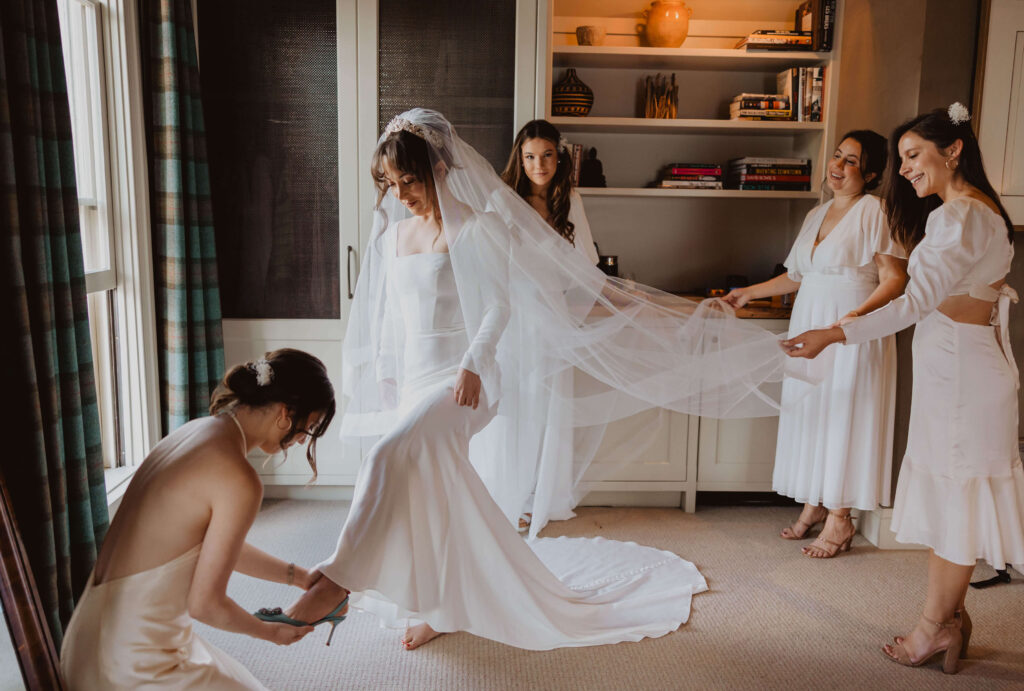 Bride getting ready with bridesmaids