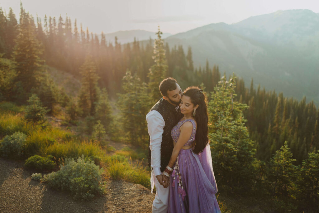 Couple posing for elopement pictures in Olympic National Park