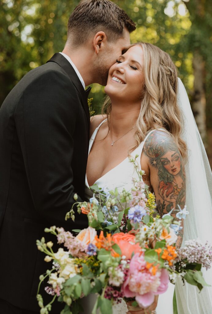Bride and groom embracing for Missouri elopement picture