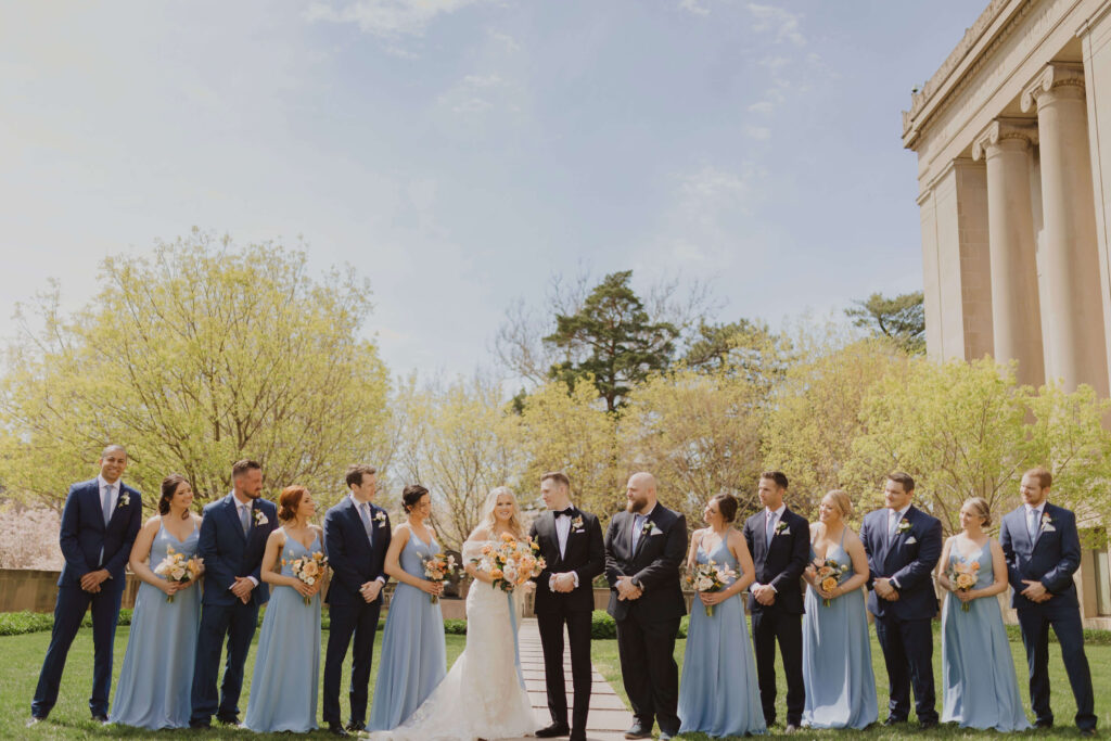 Wedding party standing with bride and groom for Kansas City wedding