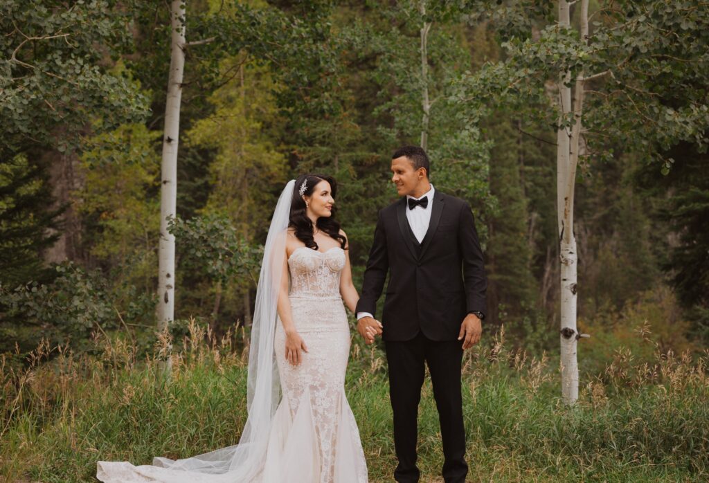 Bride and groom posing for wedding photo at Lucky 8 Ranch in Steamboat Springs, Colorado