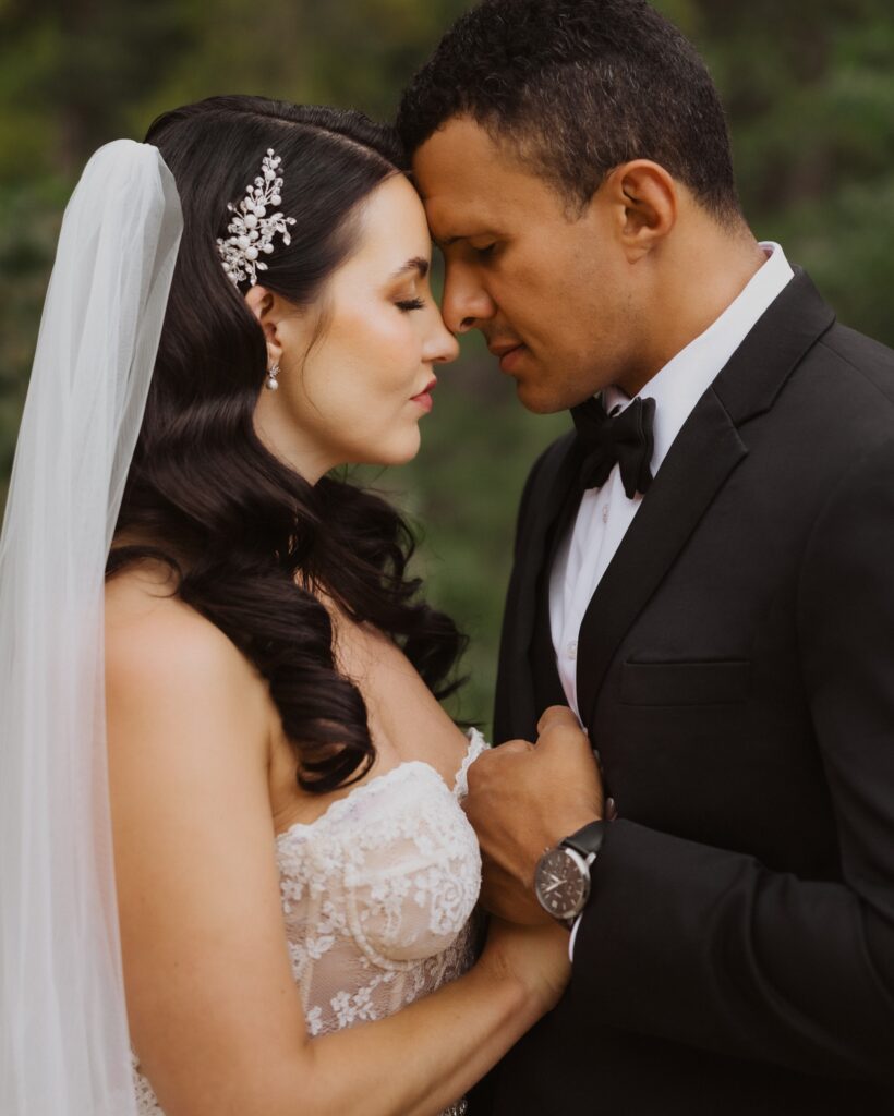 bride and groom posing for wedding photo at Lucky 8 Ranch in Steamboat Springs