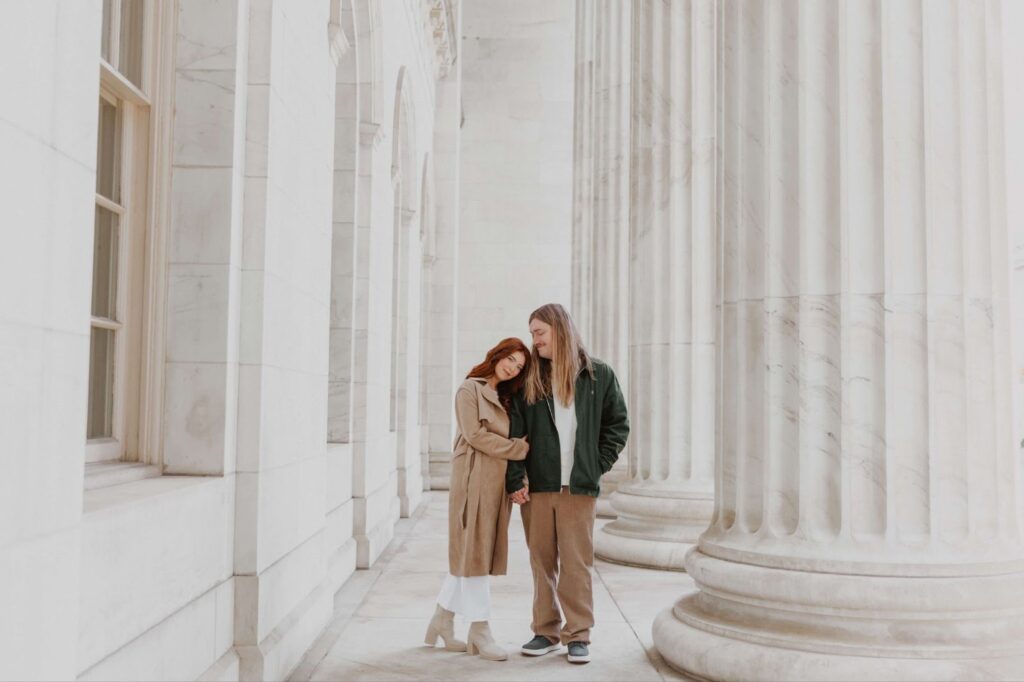 Man and woman posing for couples photography in Denver