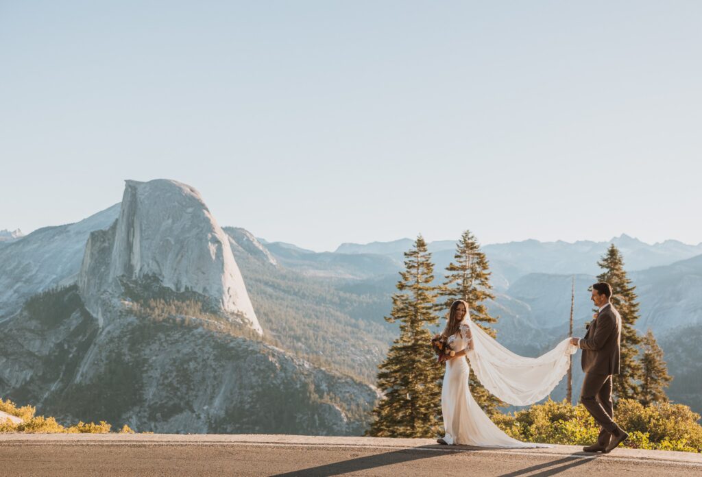 Bride and groom walking at Yosemite National Park