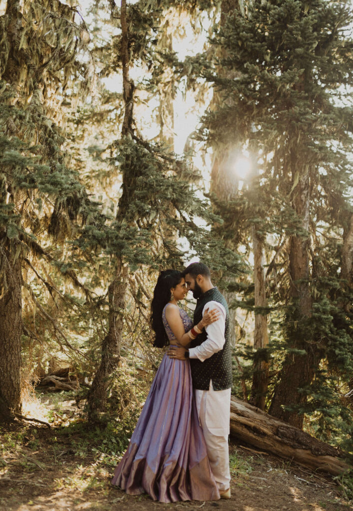 Bride and groom posing for elopement photo at Hurricane Ridge in Washington