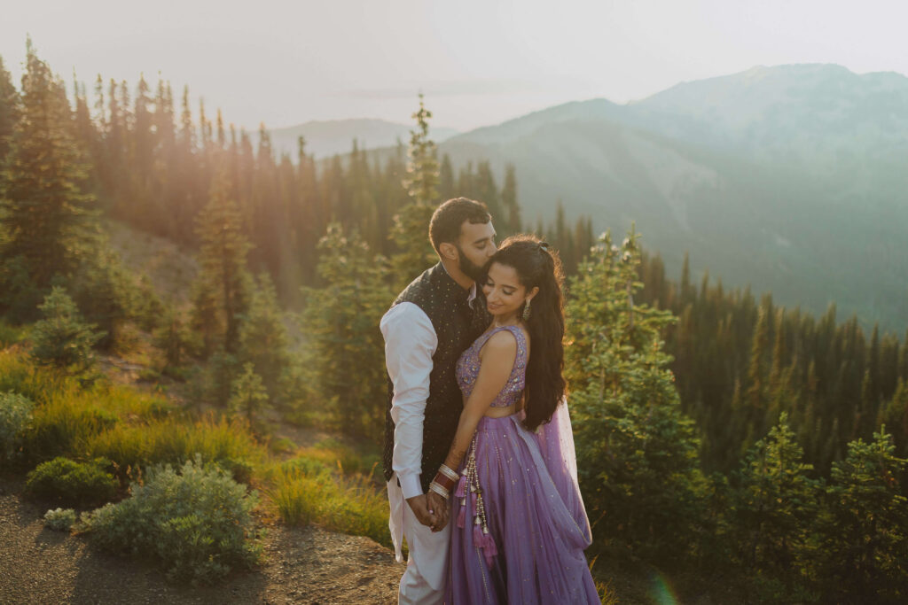Bride and groom posing for elopement photo at Hurricane Ridge in Washington