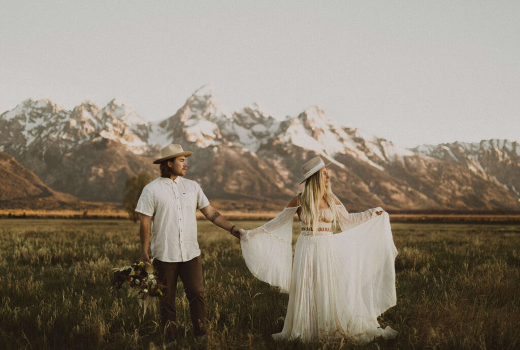 Couple posing for Grand Teton elopement photos