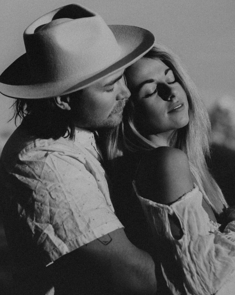 Groom embracing bride for elopement photos