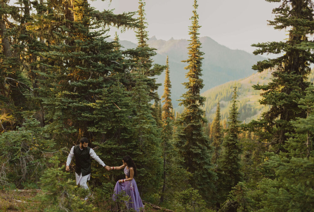 Couple walking through aspen trees at Hurricane Ridge