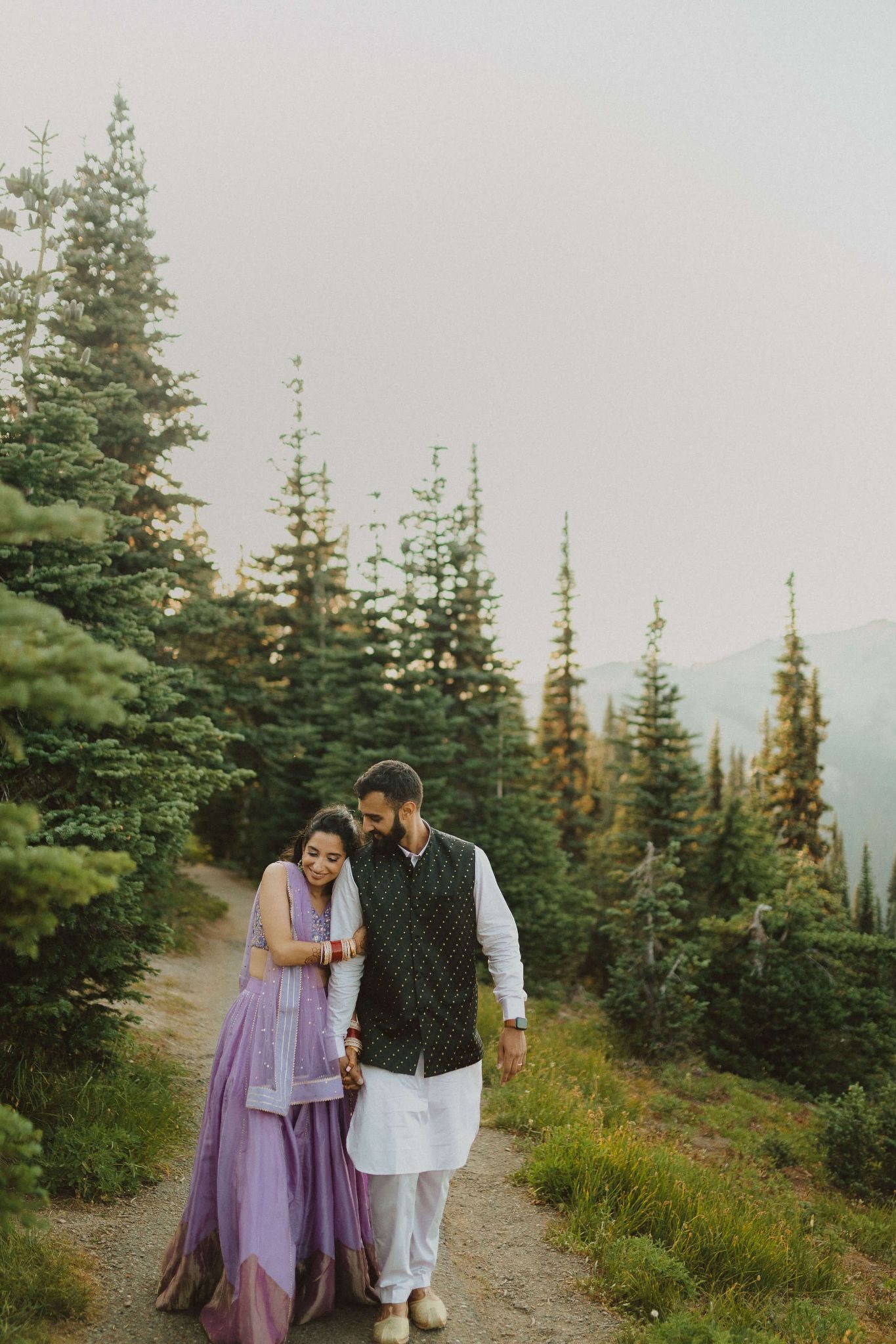 Couple surrounded by aspen trees and mountains for Hurricane Ridge elopement