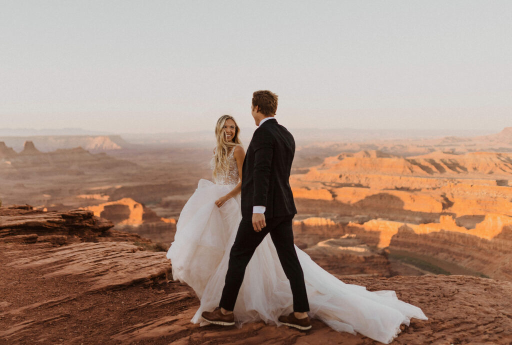 Couple walking at Arches National Park