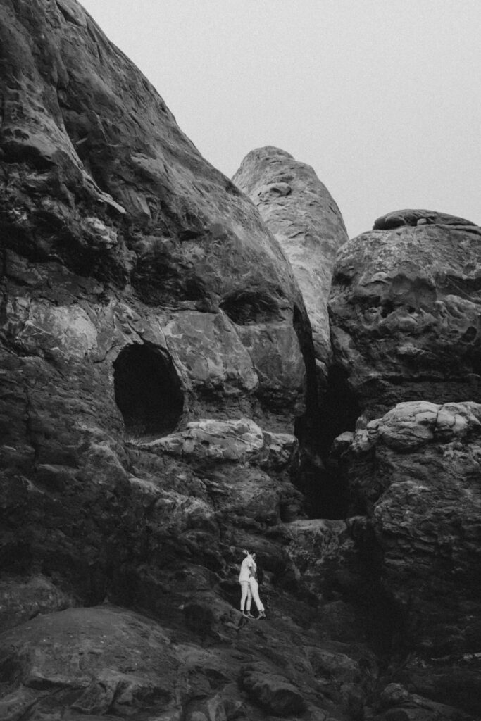 Couple hugging at Arches National Park for Utah elopement photo